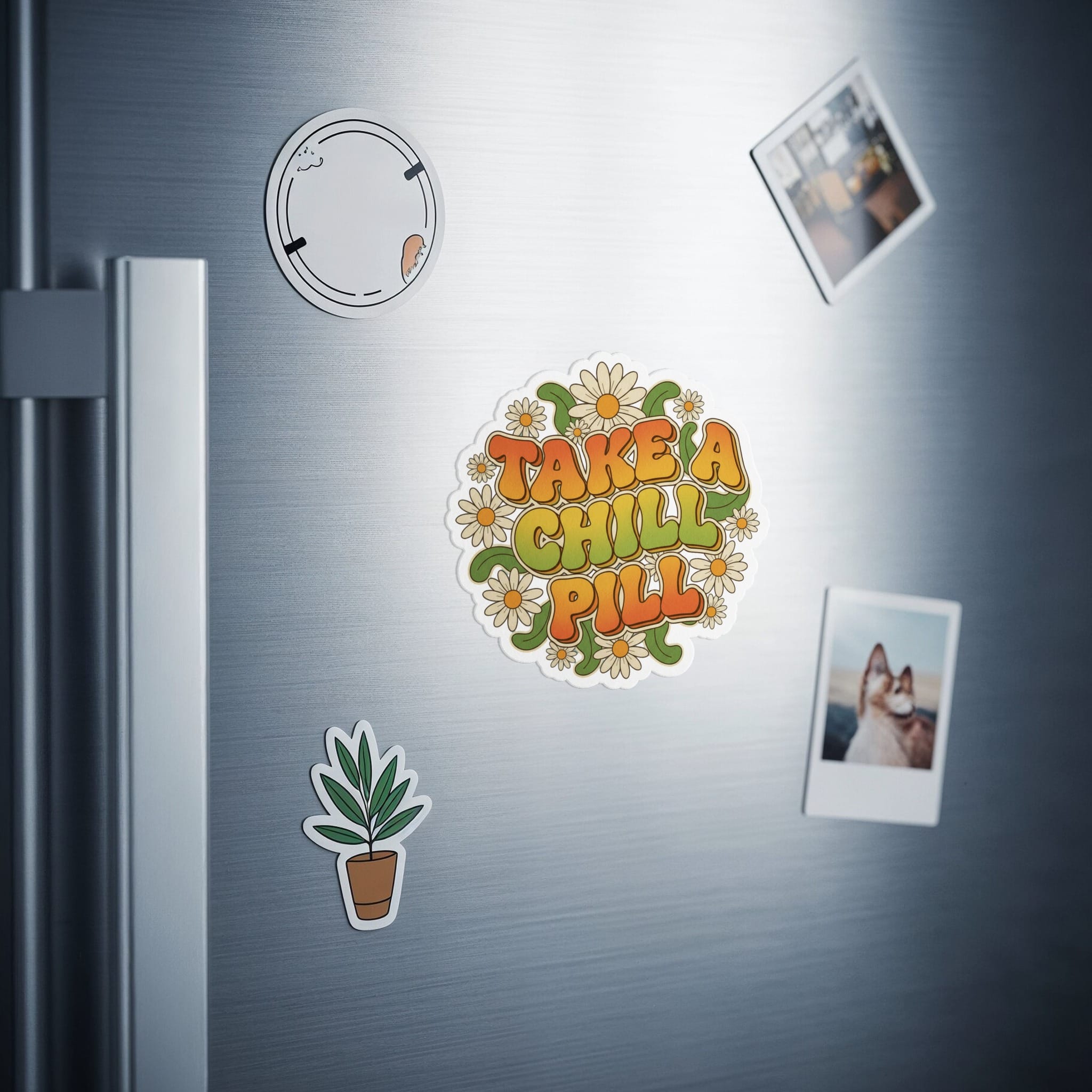 Retro "Take a Chill Pill" sticker with flowers and plants on a refrigerator.