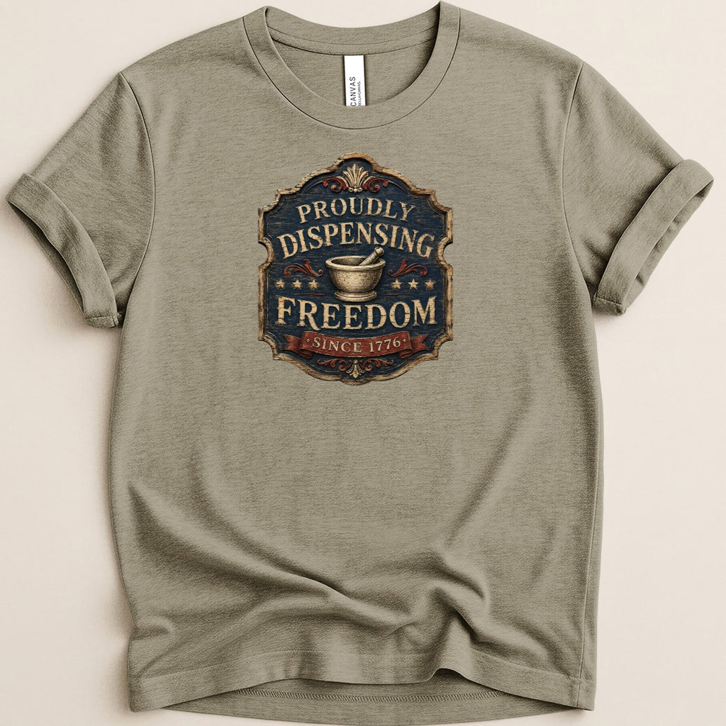 T-shirt with "Proudly Dispensing Freedom Since 1776" text and mortar and pestle emblem.