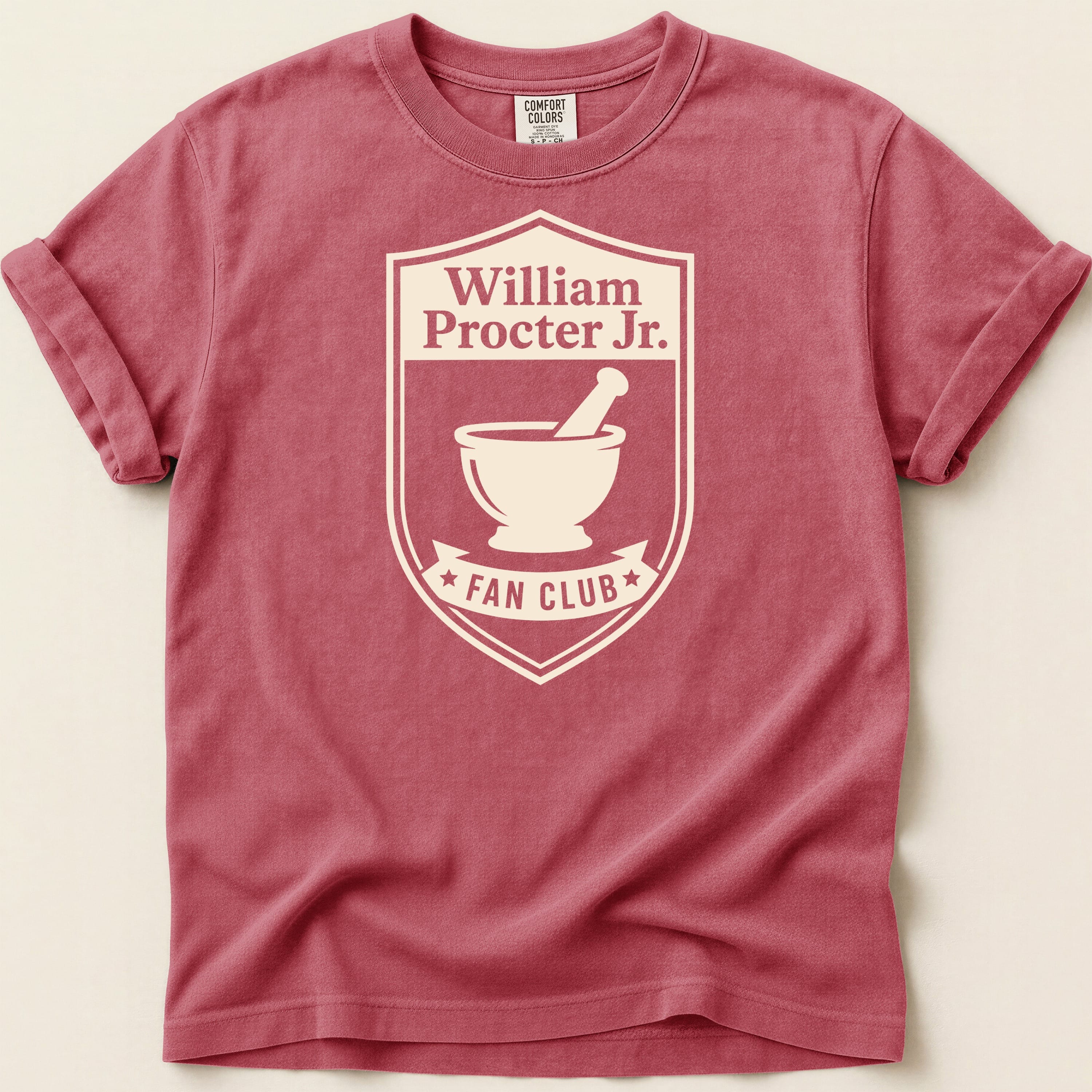 Red t-shirt with "William Procter Jr. Fan Club" and mortar and pestle emblem.