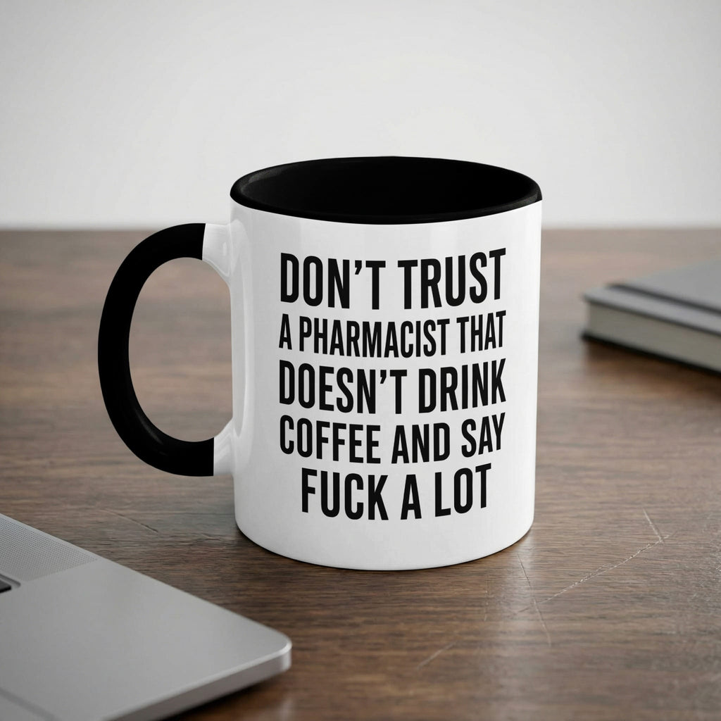 White mug with black rim and handle, features text about pharmacists and coffee.