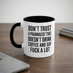 White mug with black rim and handle, features text about pharmacists and coffee.