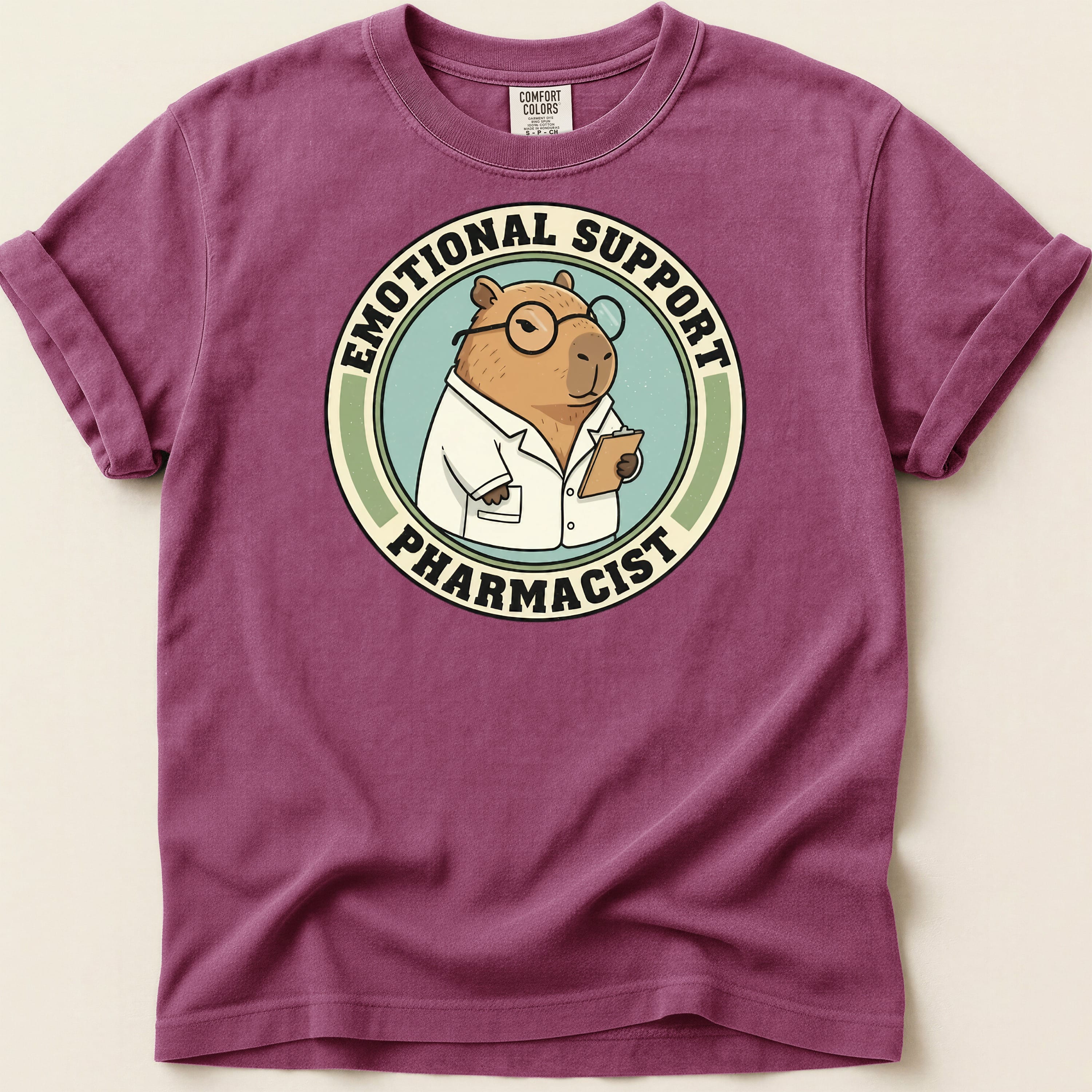 Circular graphic with a capybara wearing glasses and a lab coat, labeled "Emotional Support Pharmacist".