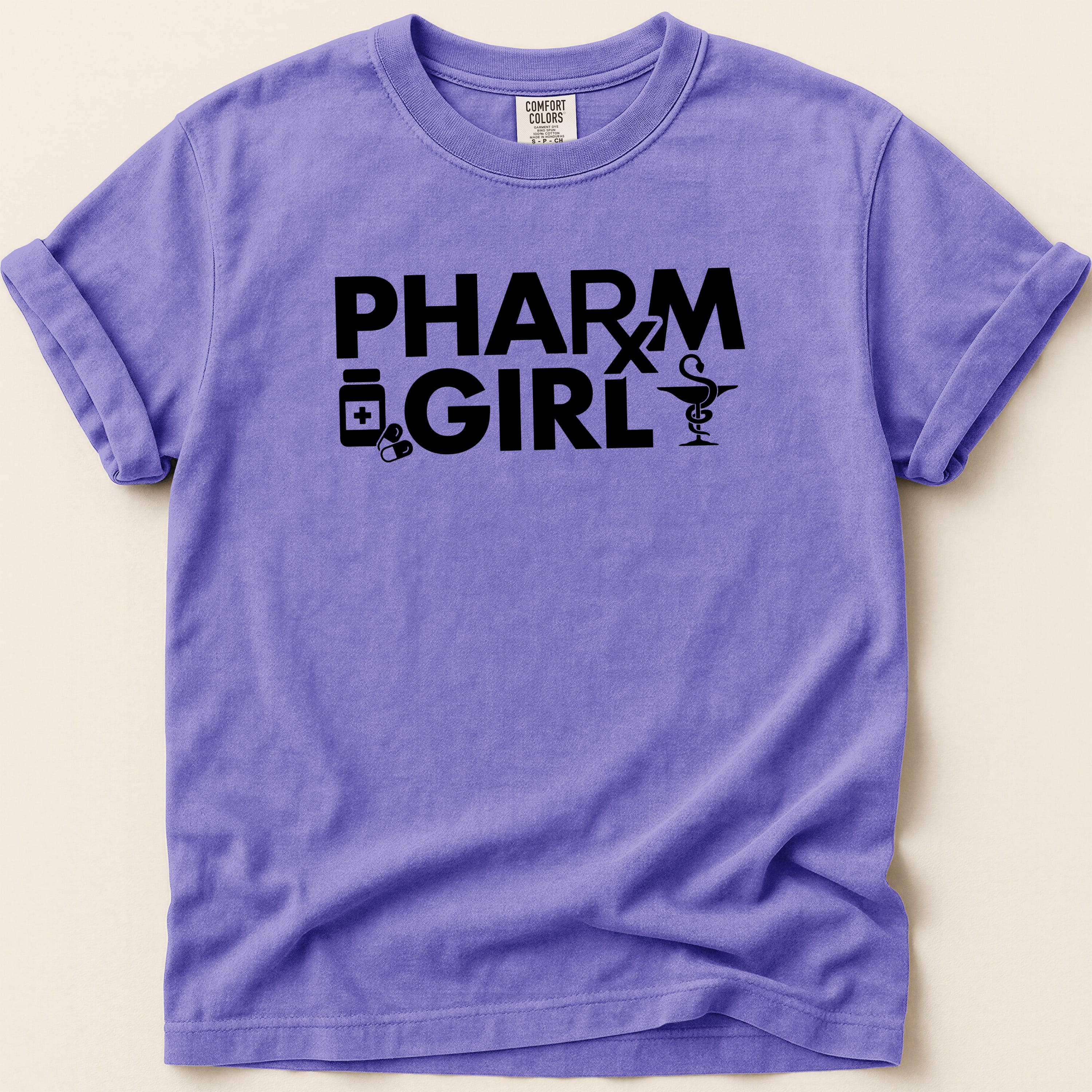 Purple t-shirt with "PHARM GIRL" and medical icons in black text.