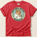 Red t-shirt with "Emotional Support Pharmacist" capybara graphic.