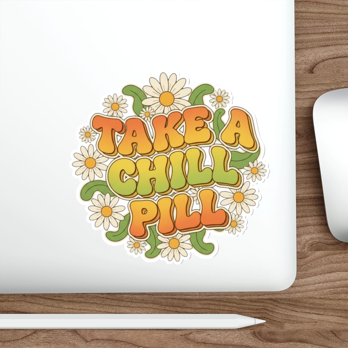 Sticker with "TAKE A CHILL PILL" text surrounded by daisies.
