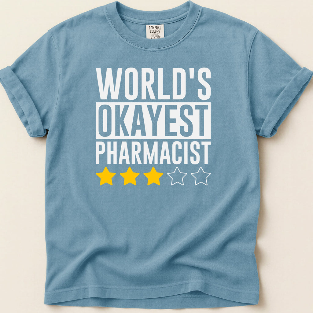 Blue t-shirt with "World's Okayest Pharmacist" and three stars.