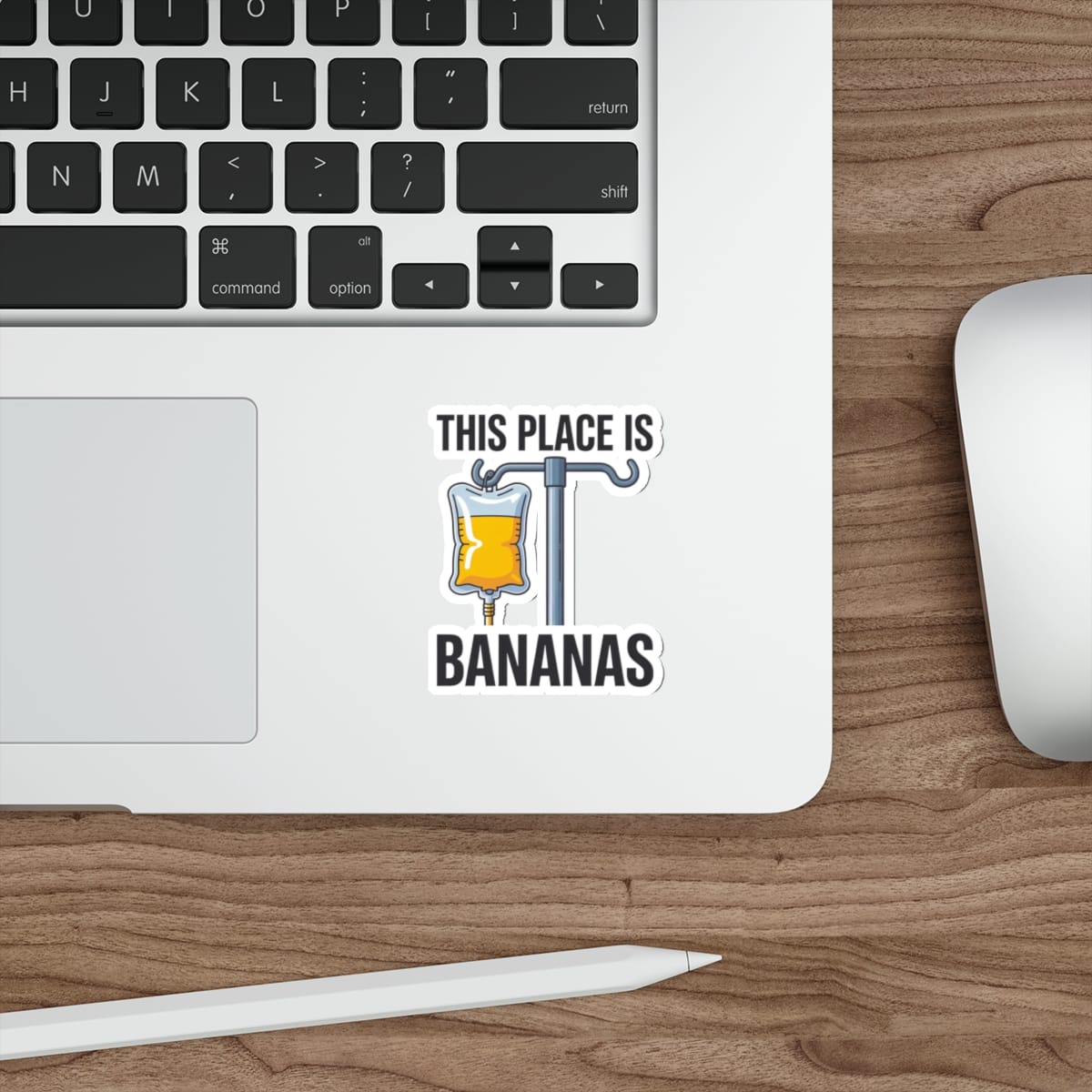 Sticker of an IV bag with "THIS PLACE IS BANANAS" text.