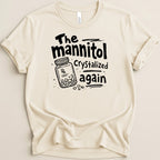 Cream t-shirt with black graphic of a prescription bottle and text "The mannitol crystallized again".