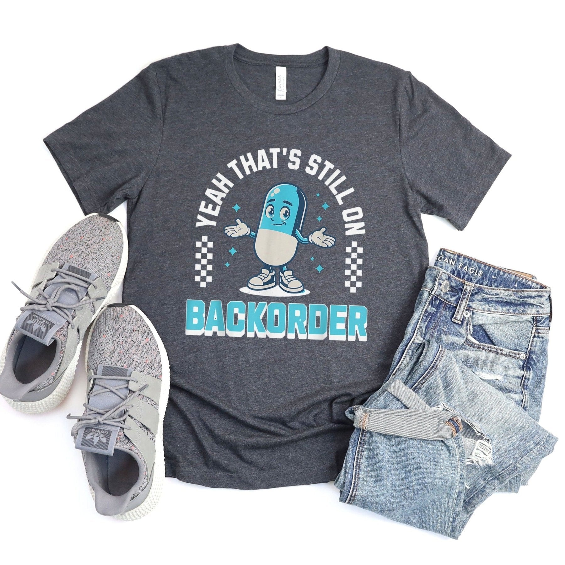 Yeah That’s Still on Backorder Blue Pill Tee - Adverse Reactions - Pharmacy Apparel for Pharmacists, Techs & Students